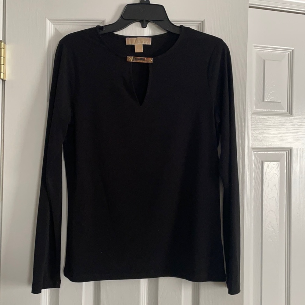 Beautiful Michael Kors top size small with gold accent
